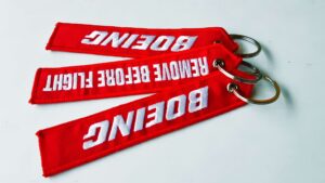 Boeing remove before flight keychain red embroidered aviation tag